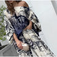 Elegant pak met blauwe print